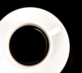black coffee in white cup in black square