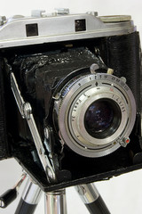 retro film camera on tripod