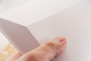 hand turning pages of a book