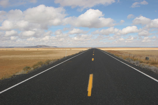 Open Highway Road With Clouds