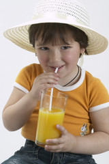 young girl drink juice