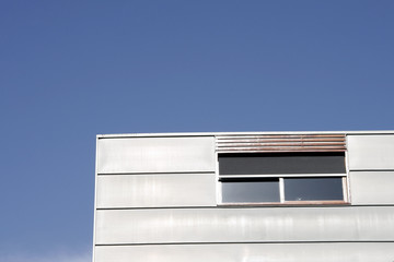 blue sky over house window