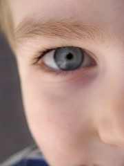 cropped view of a little boys face, soft focus