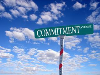 sign that reads "commitment avenue"