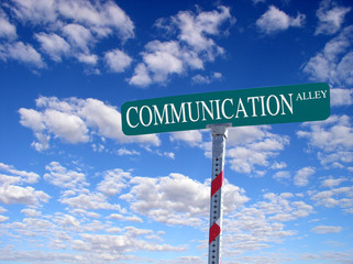 sign that reads "communication alley"