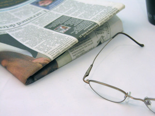glasses and newspaper