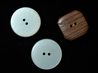 white and brown buttons