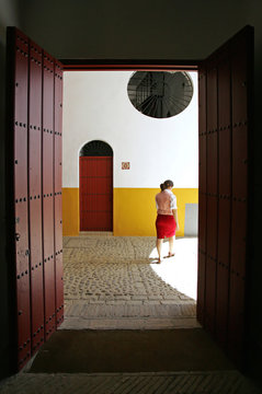 young female spanish tour guide in bullring in seville spain