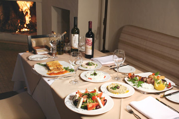 supper at a fireplace