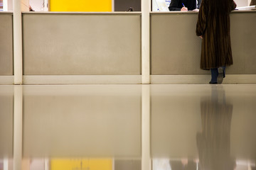 woman at info desk in airport