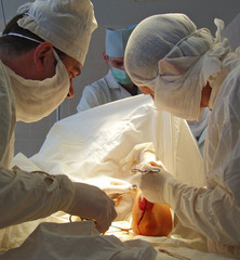 surgeons in operative room