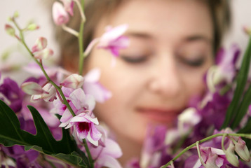 Fototapeta premium woman enjoying her flowers