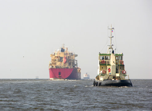 tanker and tugboat