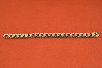 jewelery 018 gold bracelet red background
