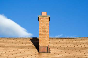 roof, chimney, and blue sky