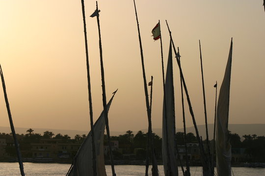 View of feluccas moored at Nile during sunset