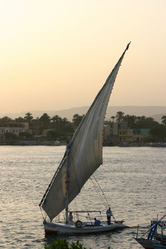 View of felucca in Nile river during sunset