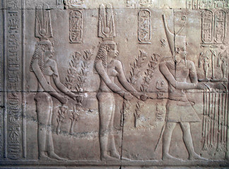 pharaoh and two women, temple of kom ombo, egypt