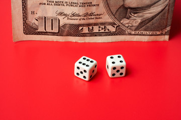 ten dollar and dices, on a red background