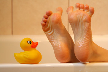 feet meeting bath duck