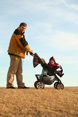 father with stroller