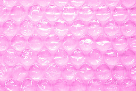 Bubble Wrap On Pink Stock Photo - Download Image Now - Bubble Wrap