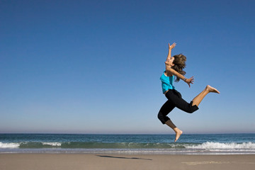 Fototapeta premium jumping on the beach