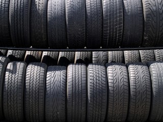 racks/rows of tires in sunlight