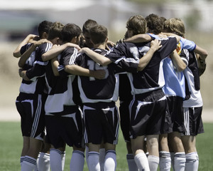 Obraz premium soccer team huddle