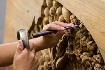 hands engraving wood