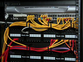 network cables plugged into patch panels
