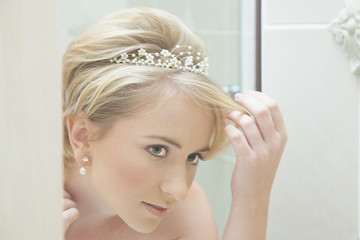 bride looking in a mirror