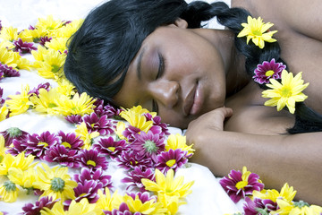 sleeping beauty in a bed of flowers