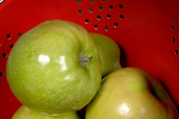 green apple in colander - granny smith apples