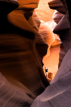 hiker in slot canyon