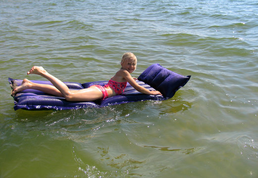 smiling girl swimming