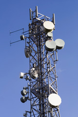 telecommunications mast and blue sky