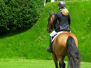 woman riding a horse