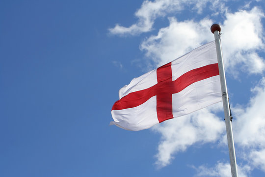 flag of st george against a blue sky (with room fo