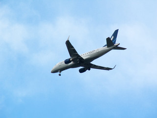 airplane in the blue sky