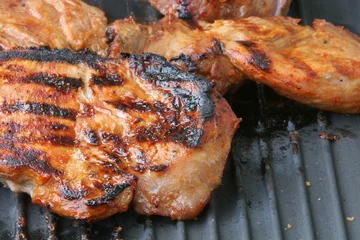 Photo sur Plexiglas Grill / Barbecue fat piece of meat
