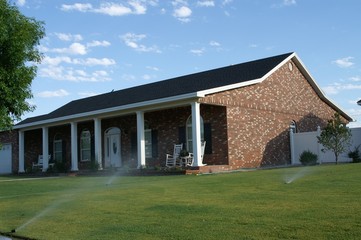 Fototapeta na wymiar brick home with front porch