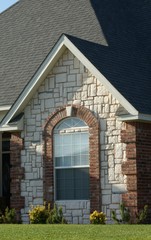 brick and stone arched window