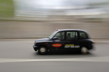 Fototapeta na wymiar London Taxi w ruchu