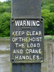 old winch warning sign