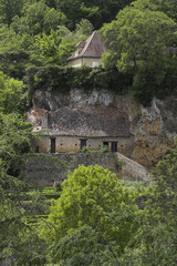 Fototapeta na wymiar house carved in cliffs