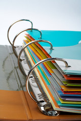 binder closeup with files stacked