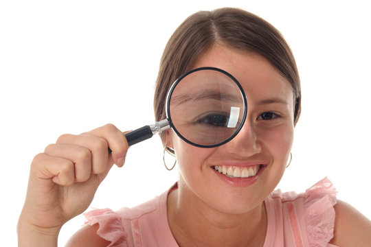 Woman Holding Magnifying Glass