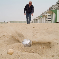 playing a ball game on the beach