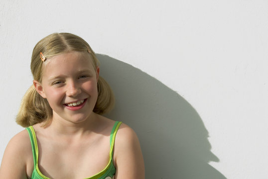 portrait of a young girl with big shadow